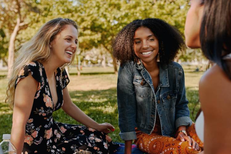 girls in park having a picnic